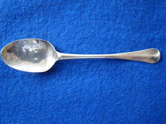 An American Silver Teaspoon made for a child circa 1720-1750 with maker's mark NK